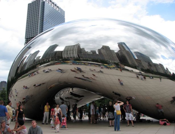Cloud Gate, Chicago: Families congregate around the huge Silver bean, Waiting for their turn to take a photo of themselves...