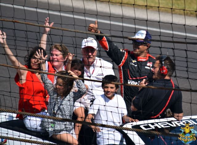 Juan Pablo Montoya, Winner of the 99th Indy 500, celebrating with his family and boss, Roger Penske